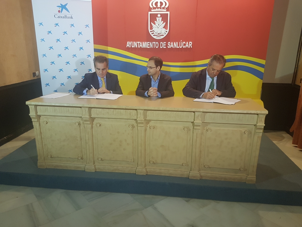 Firma del Convenio con Caixabank